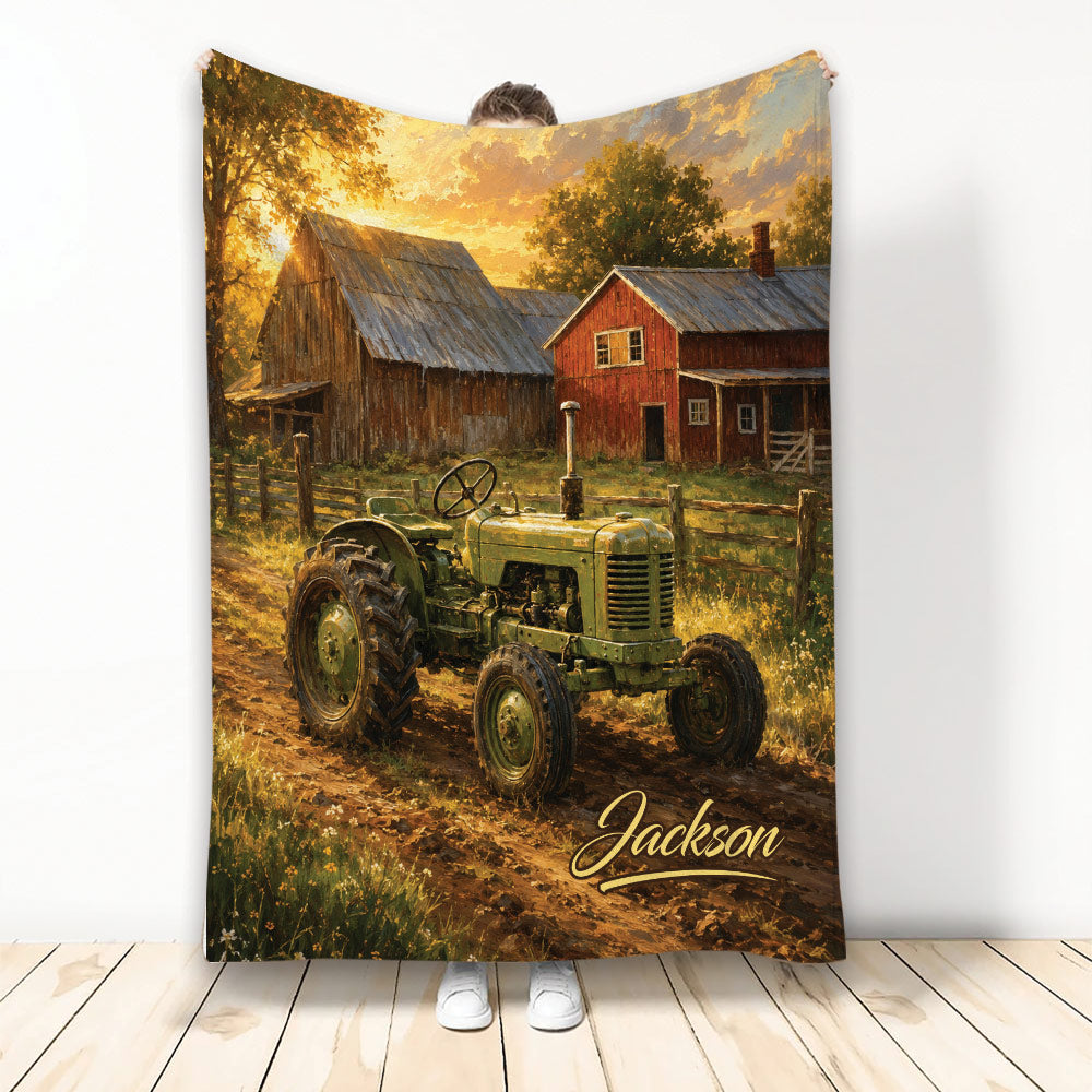 Rustic tractor blanket displayed upright with a vintage farm scene, red barn, golden fields, and autumn trees