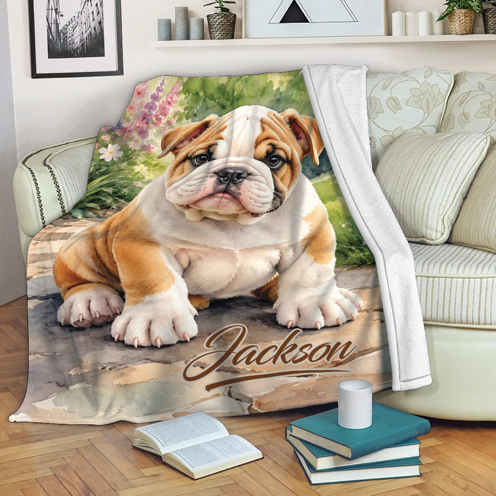 English Bulldog throw blanket draped over a sofa with vibrant garden artwork