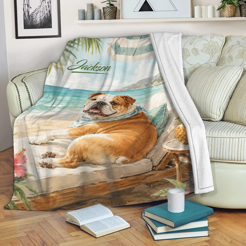 English Bulldog throw blanket displayed on a sofa with colorful beach artwork and tropical coastal decor