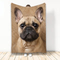 French Bulldog blanket displayed upright with a close-up tan Frenchie design in a cozy home setting