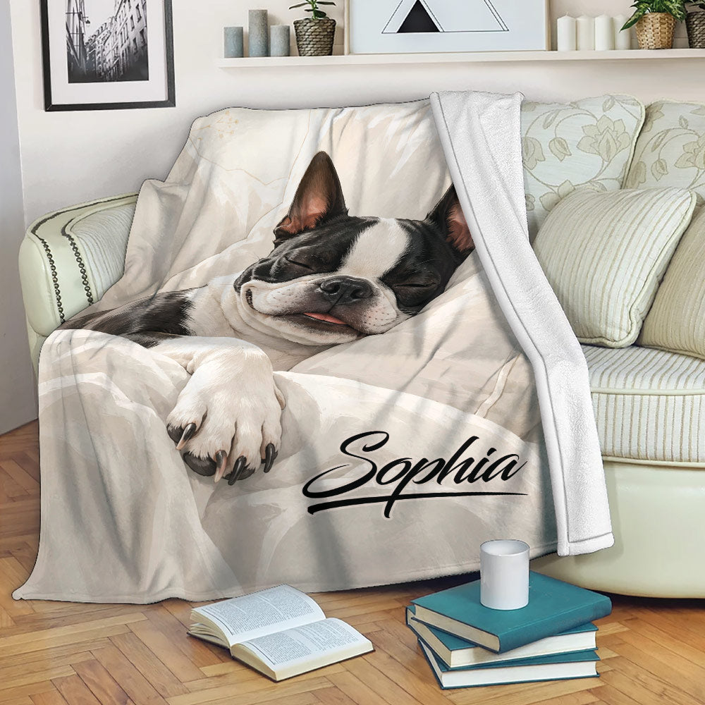 Boston Terrier blanket draped over a sofa with cozy neutral dog artwork and reading nook decor