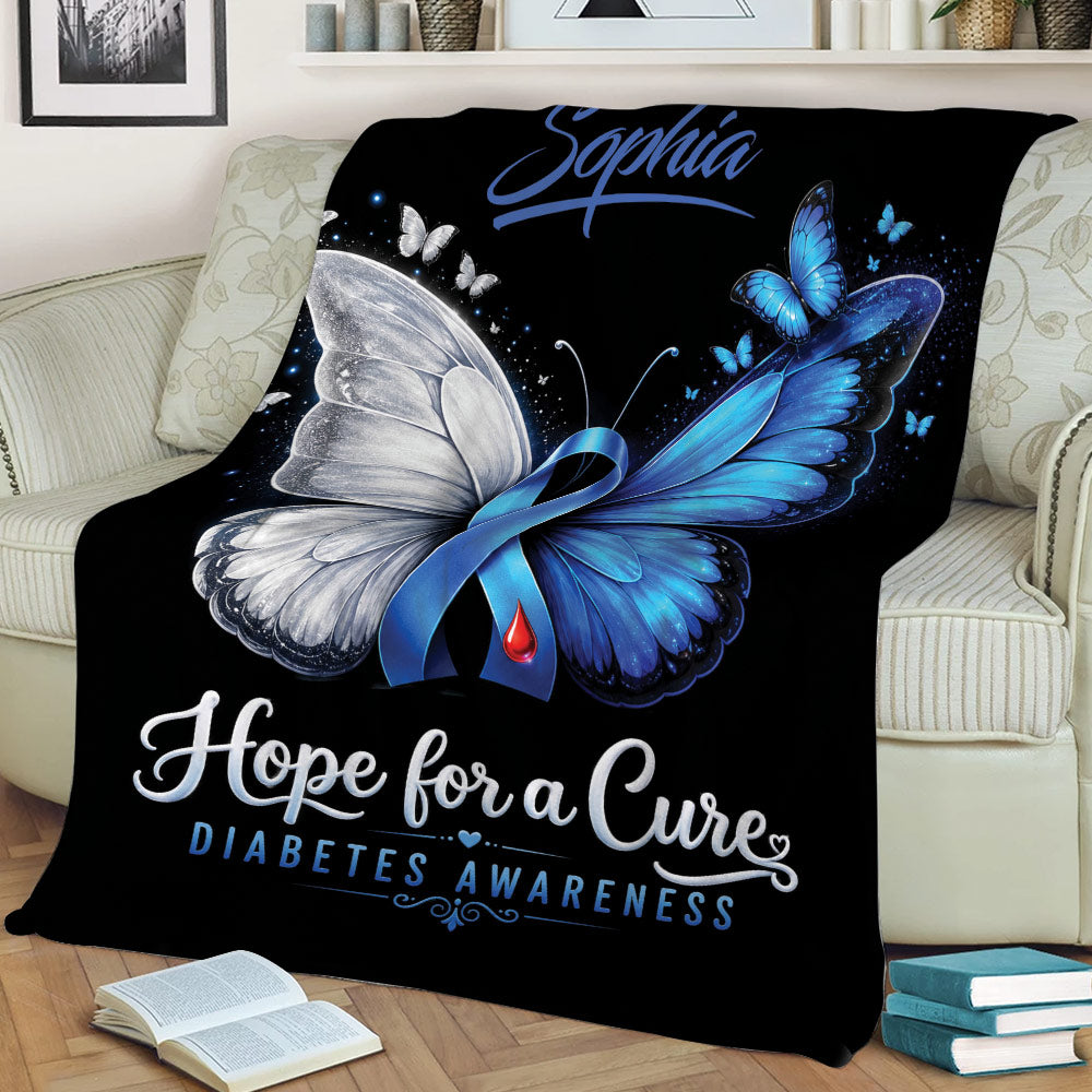 Black diabetes awareness blanket featuring a blue and silver butterfly with ribbon symbolism