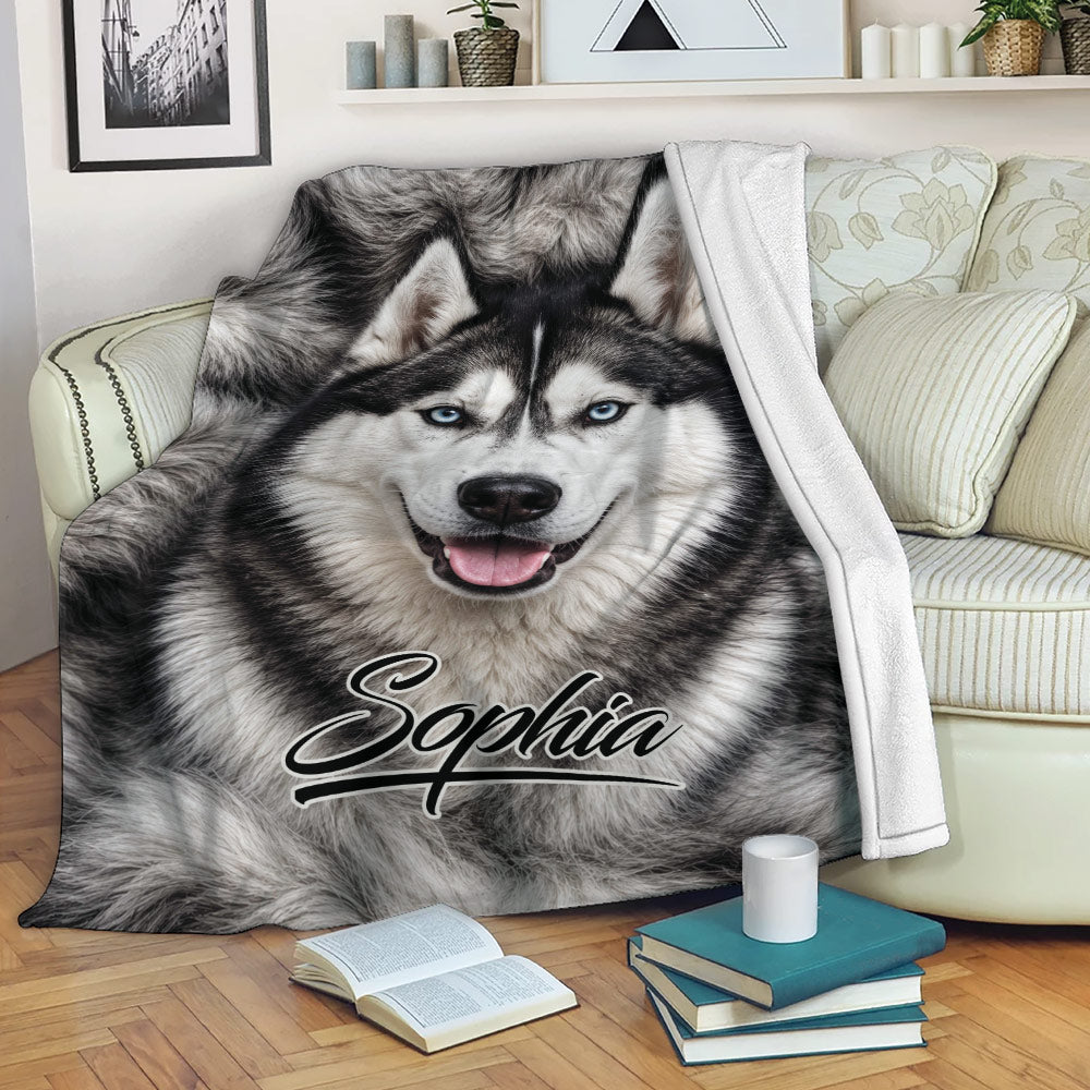 Husky throw blanket displayed on a sofa with cozy dog artwork for home lounging