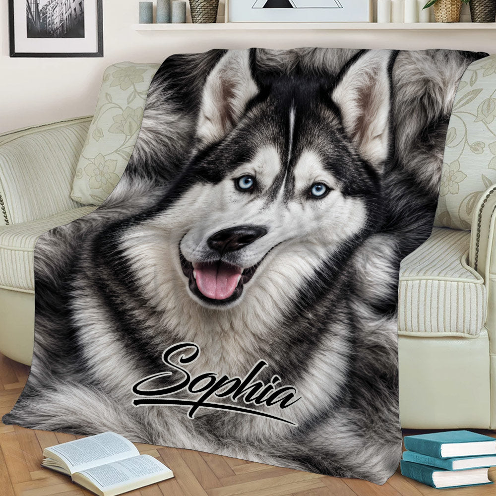 Close-up Husky throw blanket featuring expressive blue eyes and black-and-white fur