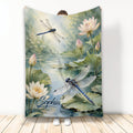 Dragonfly blanket with blue dragonflies, lotus flowers, and a serene watercolor pond landscape