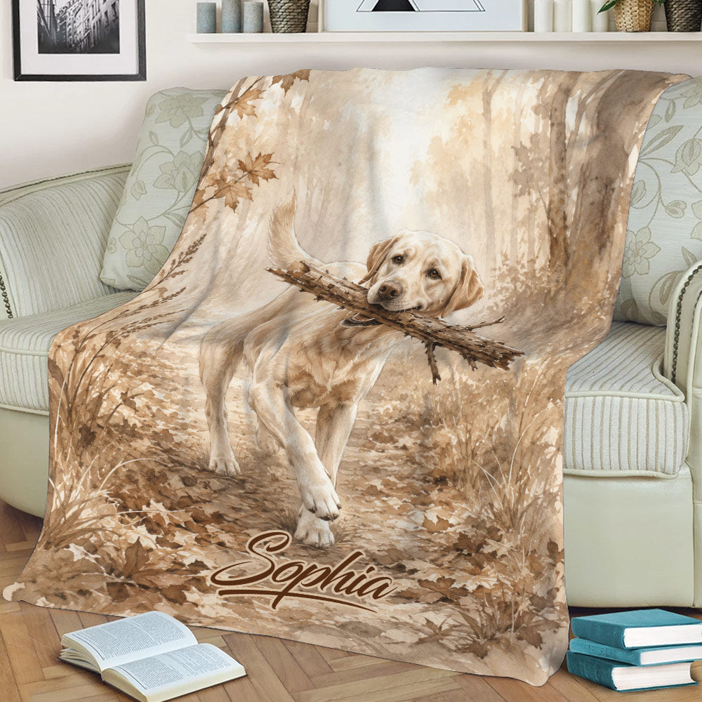Rustic Labrador Retriever blanket displayed on a sofa with autumn woodland artwork