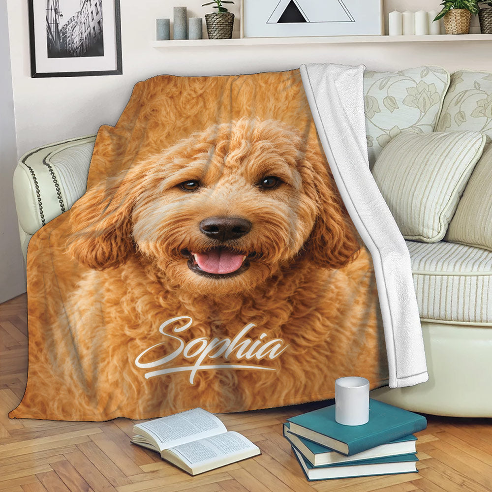 Goldendoodle blanket draped over a sofa, showcasing a cheerful curly dog design in a cozy room
