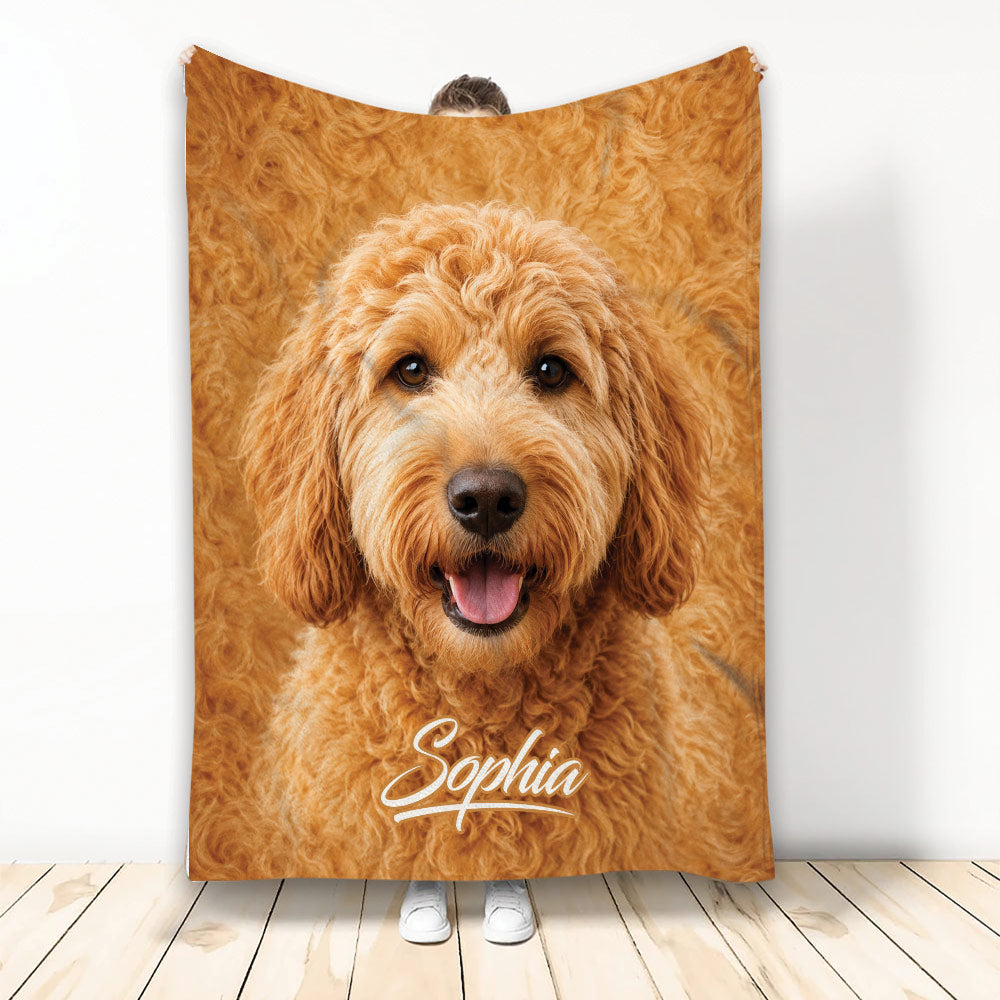 Goldendoodle throw blanket featuring a close-up curly golden dog portrait in warm amber tones