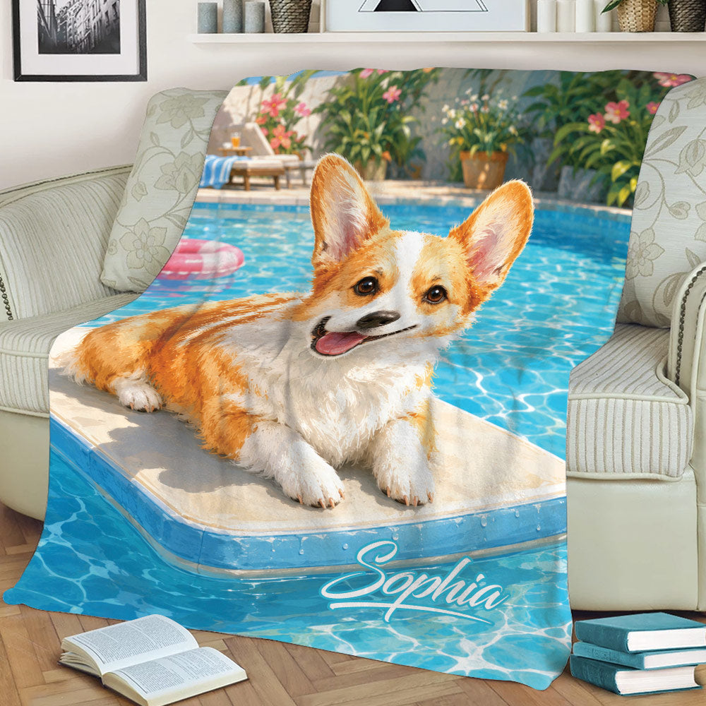 Corgi throw blanket displayed on a sofa with a playful poolside dog and tropical garden artwork