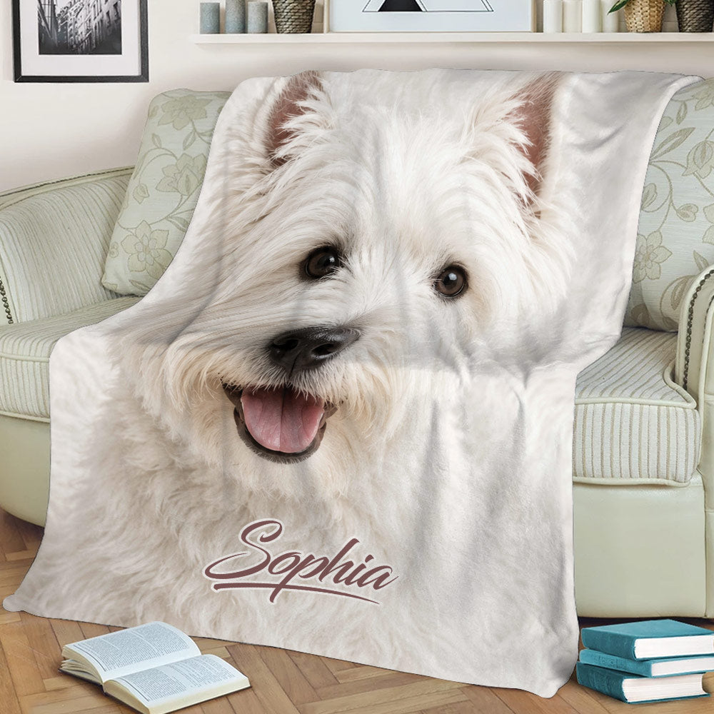 Westie blanket displayed on an armchair, featuring a close-up white terrier face for cozy home decor