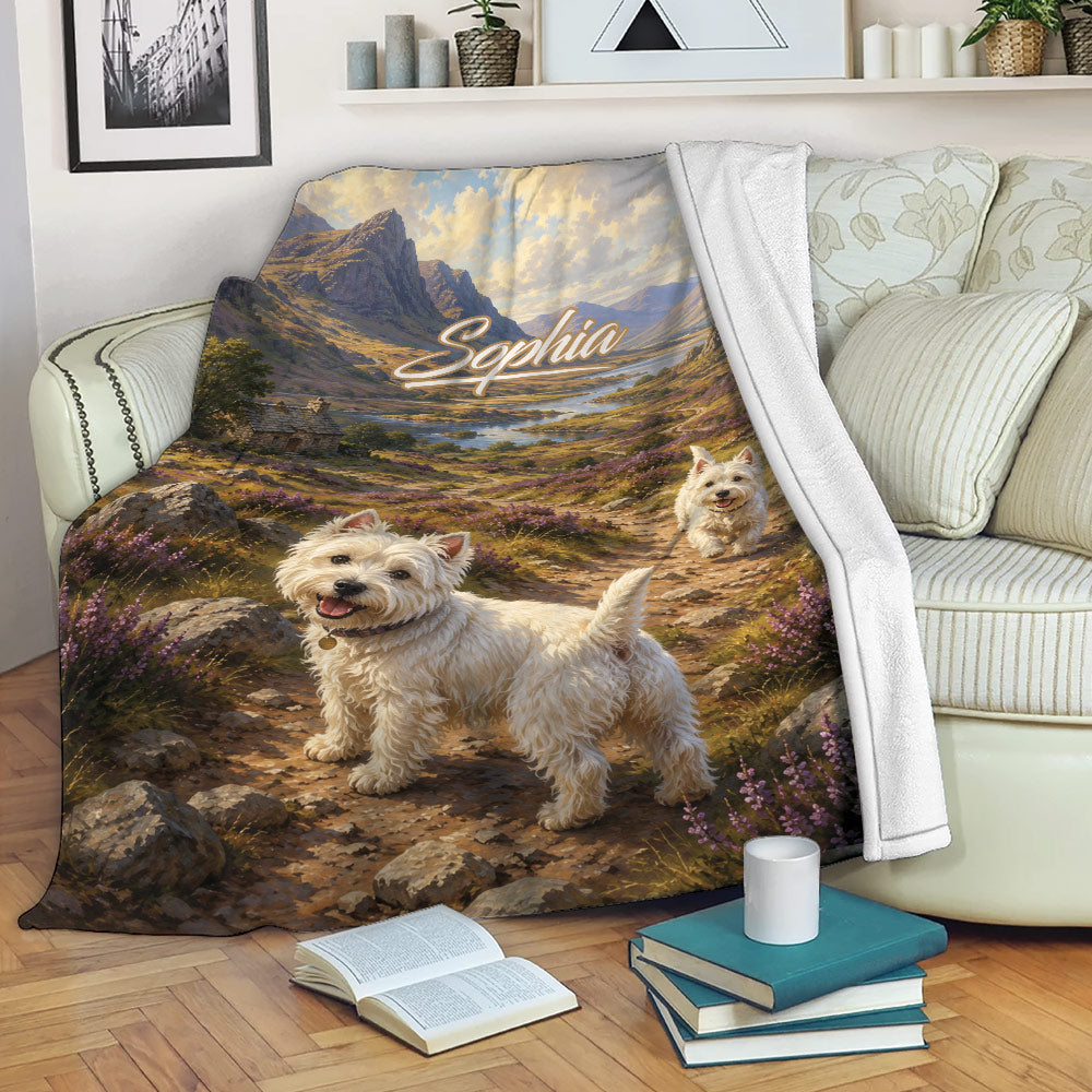 Westie blanket displayed on a sofa with two West Highland White Terriers in a mountain landscape