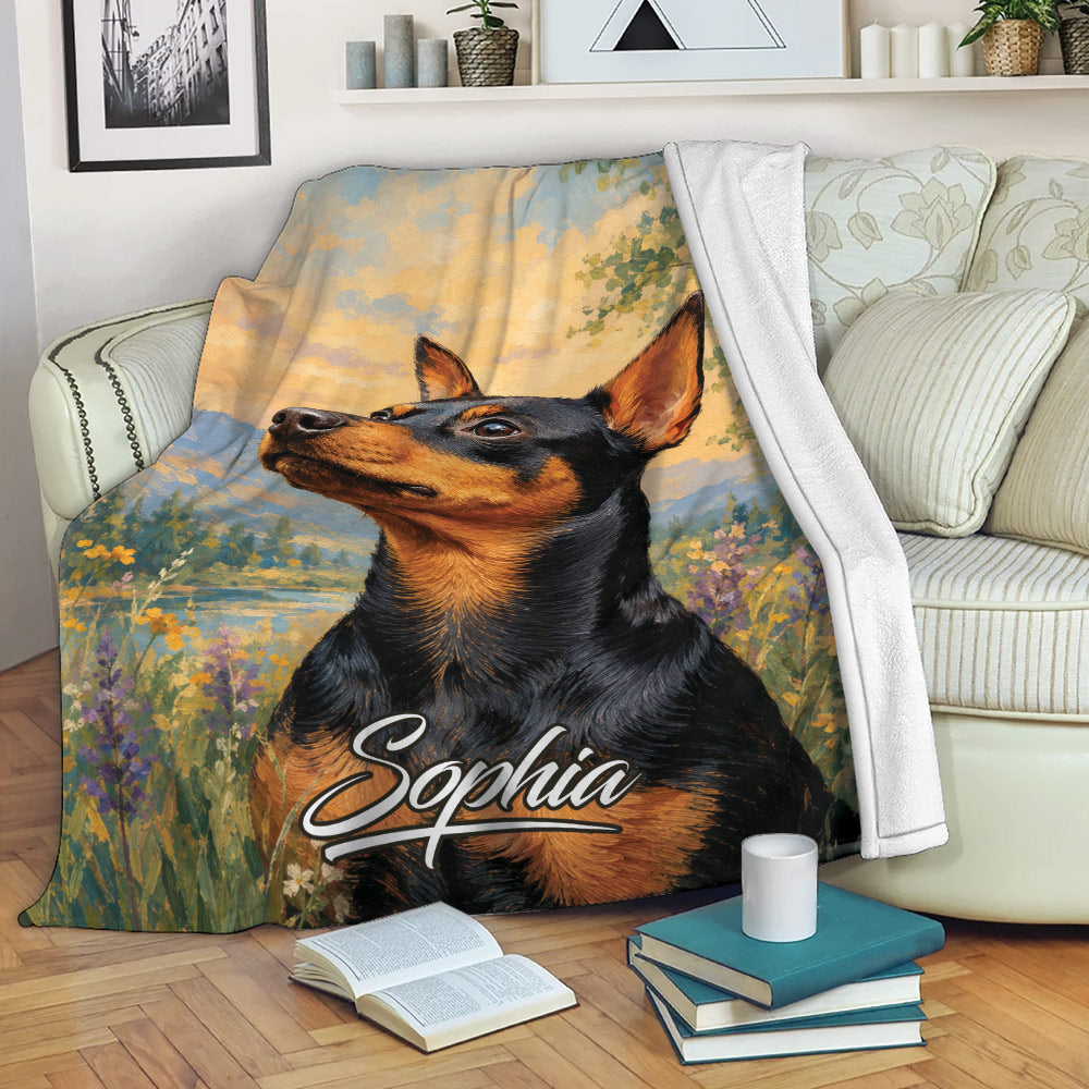 Miniature Pinscher throw blanket displayed on a sofa with scenic landscape artwork