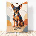 Miniature Pinscher throw blanket with colorful geometric dog artwork displayed as a hanging room accent