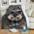 Miniature Schnauzer throw blanket draped over a sofa in a cozy living room