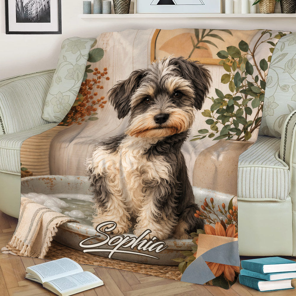 Close view of a Miniature Schnauzer throw blanket with rustic botanical artwork on a couch