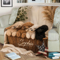 Close lifestyle view of a Poodle throw blanket with four puppies in a basket and rustic decor