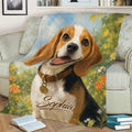 Beagle throw blanket displayed on a sofa with expressive dog artwork, flowers, and blue sky