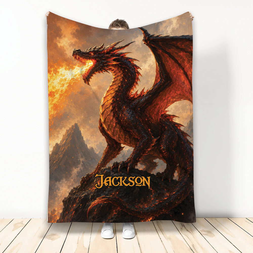 Dragon throw blanket featuring a fire-breathing black and red dragon above a rugged mountain landscape