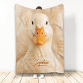 Duck throw blanket displayed upright with a close-up white duck design and warm beige artwork