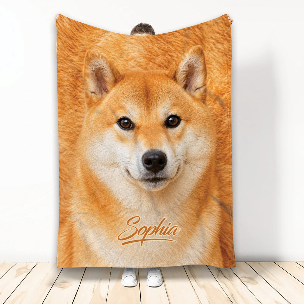 Shiba Inu throw blanket displayed upright with a close-up orange dog design