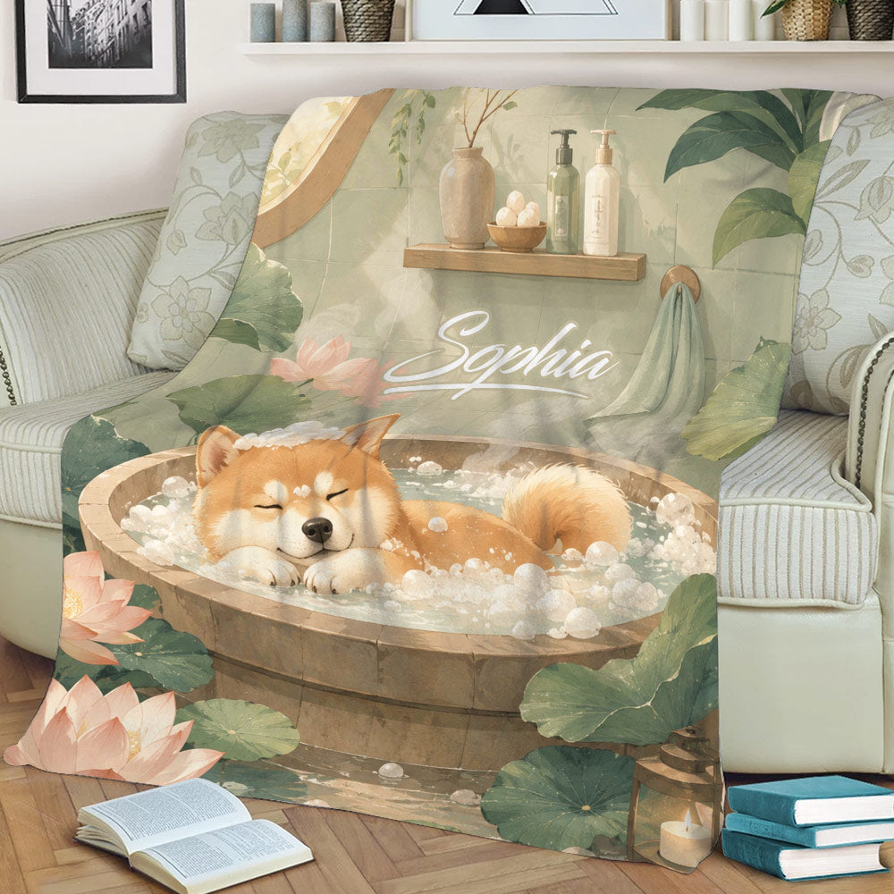Shiba Inu blanket displayed on a sofa with a serene bath scene, lotus flowers, and botanical artwork
