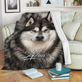 Alaskan Malamute blanket draped over a sofa with realistic black and white dog artwork for cozy lounging