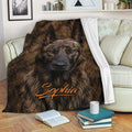 Dutch Shepherd blanket draped over a living room sofa with warm brown dog artwork
