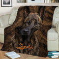 Dutch Shepherd throw blanket displayed across a sofa with detailed brindle dog artwork