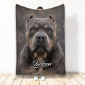 American Bully throw blanket with a close-up gray dog portrait design displayed against a wall