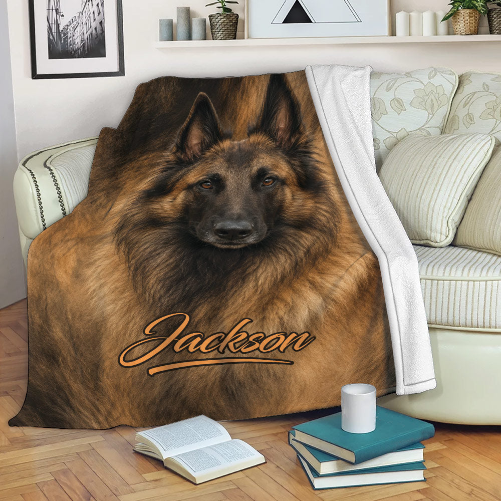 Belgian Shepherd blanket displayed on a sofa with realistic dog artwork and cozy living room decor