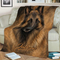 Belgian Shepherd throw blanket draped over a sofa, featuring detailed long-haired dog artwork