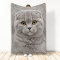 Scottish Fold cat throw blanket featuring a close-up gray cat design in a lifestyle display