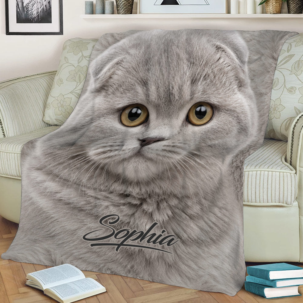 Scottish Fold cat throw blanket displayed on a sofa with detailed gray cat artwork