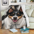 Rat Terrier blanket draped over a sofa with a cheerful tricolor dog design