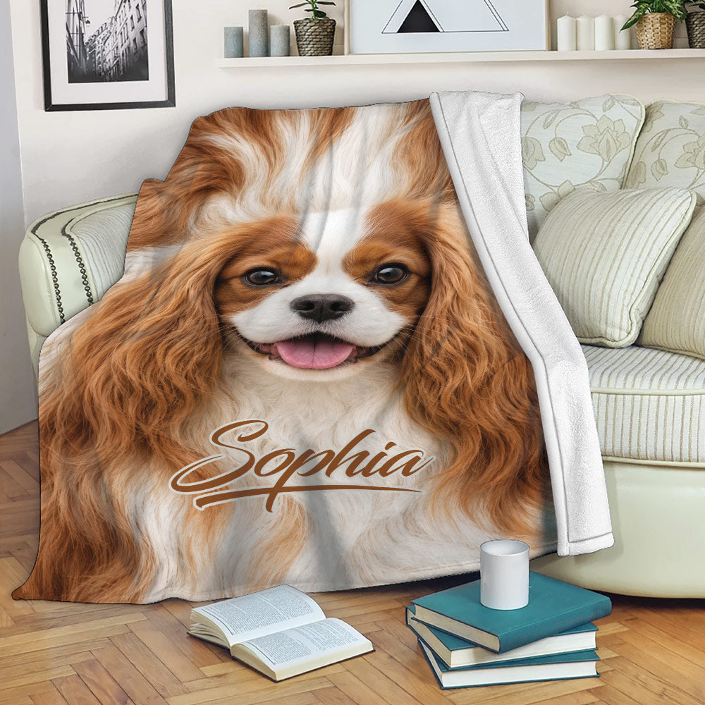 Cavalier King Charles Spaniel throw blanket displayed across a cozy living room sofa