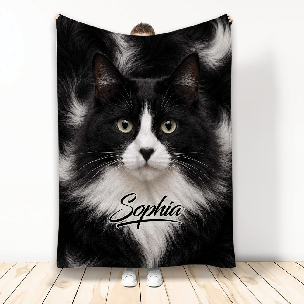 Tuxedo cat blanket featuring a close-up black-and-white cat design in a full blanket display