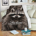 Raccoon throw blanket draped over a sofa in a cozy living room setting