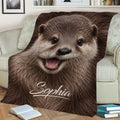 Close-up otter throw blanket featuring expressive eyes and detailed brown fur on a sofa