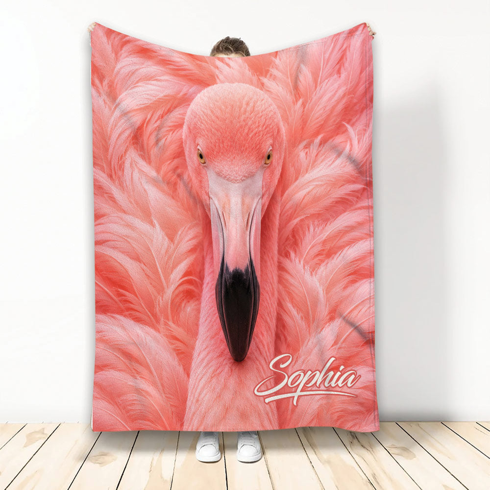 Pink flamingo throw blanket with close-up bird artwork and tropical feather pattern