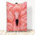 Pink flamingo throw blanket with close-up bird artwork and tropical feather pattern