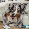 Australian Shepherd throw blanket styled on a sofa with close-up blue merle dog artwork