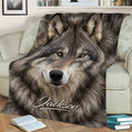 Close view of realistic gray wolf artwork on a living room throw blanket