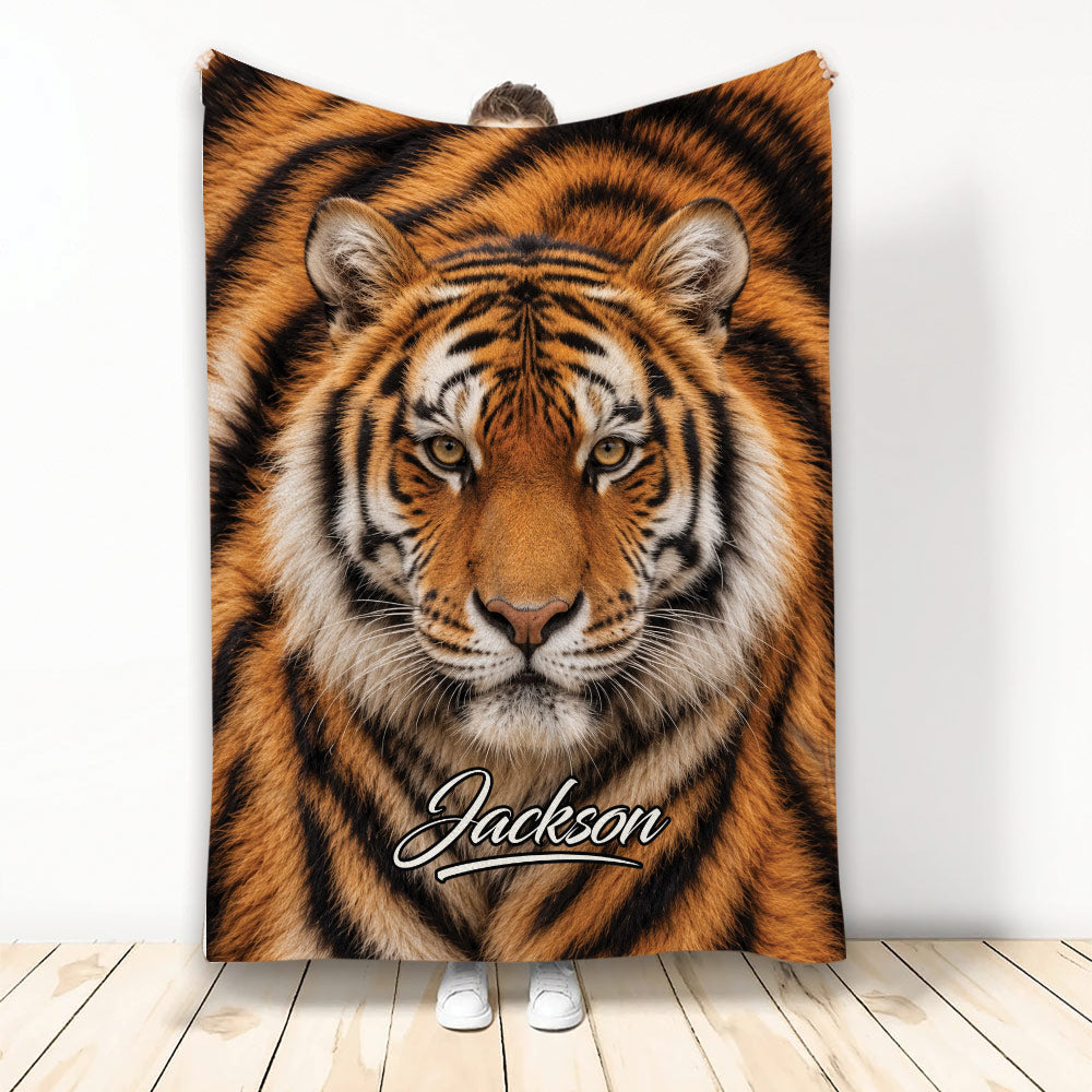 Tiger throw blanket with a close-up orange and black tiger face in bold wildlife artwork