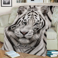 Close-up tiger throw blanket displayed across a sofa, featuring realistic eyes and detailed striped fur