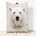 Polar bear throw blanket displayed upright with detailed white bear artwork in a bright room