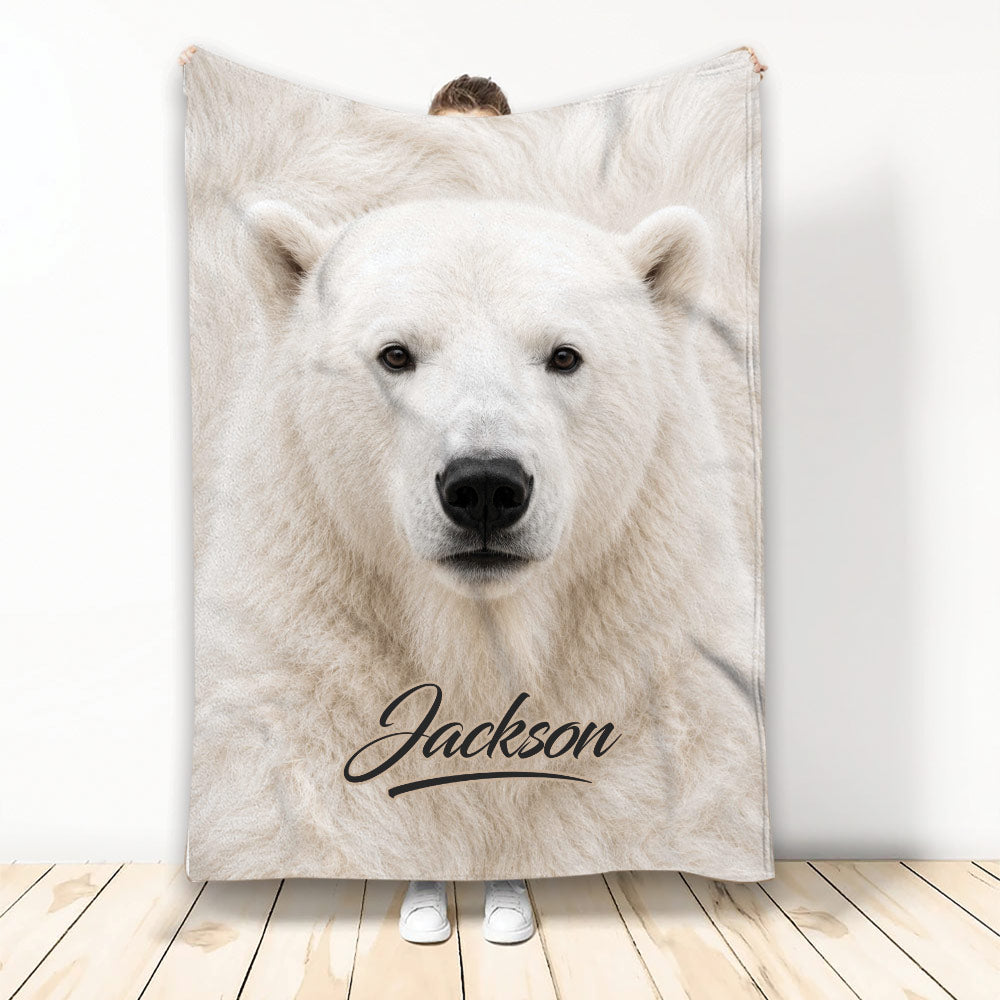 Polar bear throw blanket displayed upright with detailed white bear artwork in a bright room