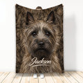 Cairn Terrier throw blanket featuring a close-up shaggy dog portrait in warm brown tones