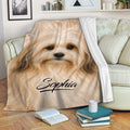 Tan Havanese dog blanket draped over a sofa in a cozy living room setting