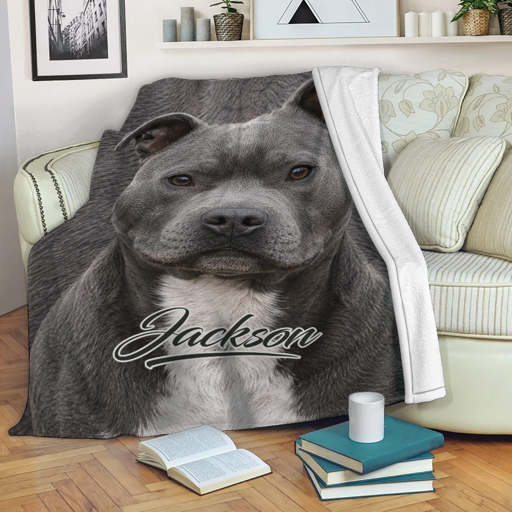 Staffordshire Bull Terrier throw blanket draped over a sofa in a cozy living room