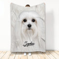 Maltese dog throw blanket displayed upright with a soft white long-haired dog design